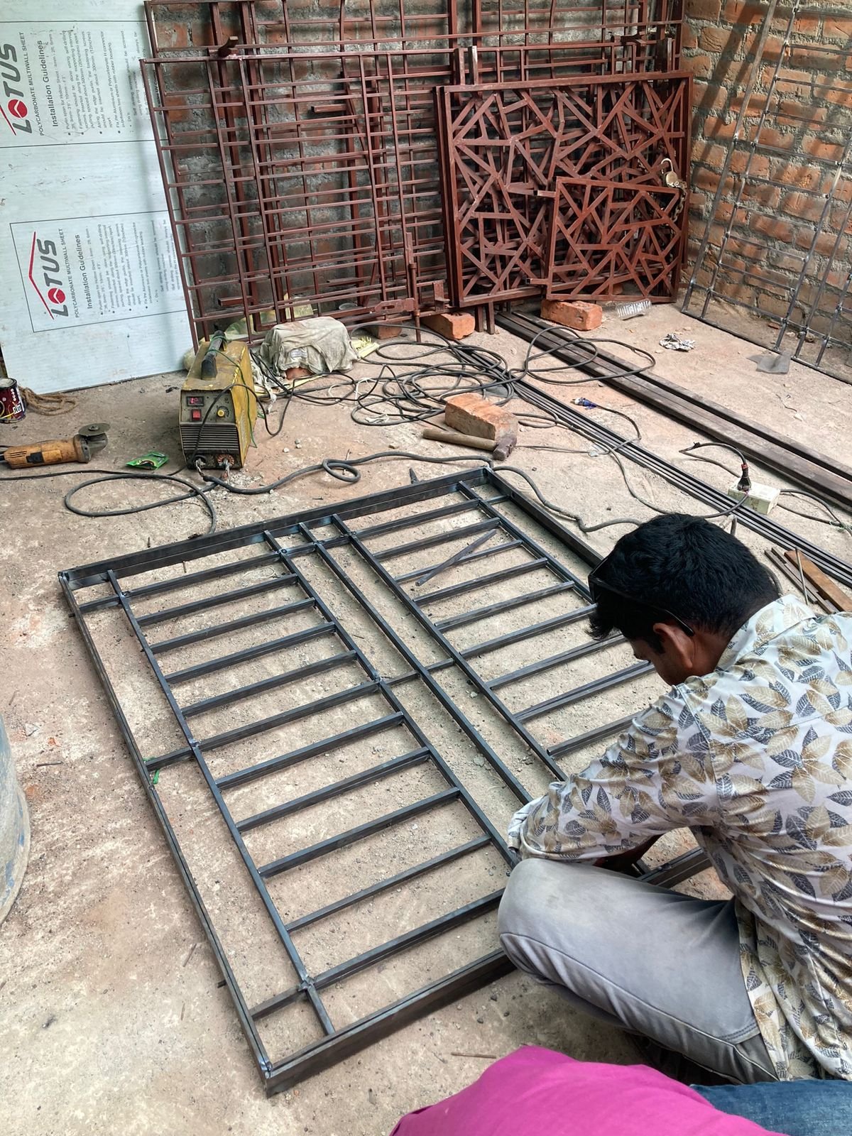 Metal gate frame under fabrication at site